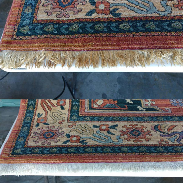 A rug being cleaned and the area is clean.